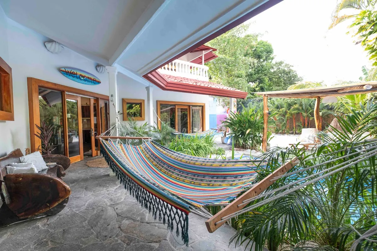 First story patio of main villa facing basketball court