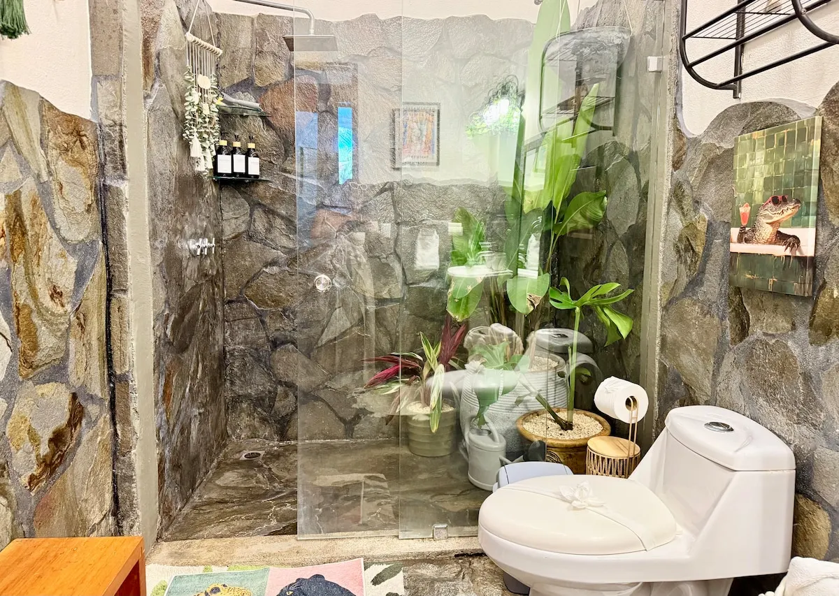 Stone shower with glass door