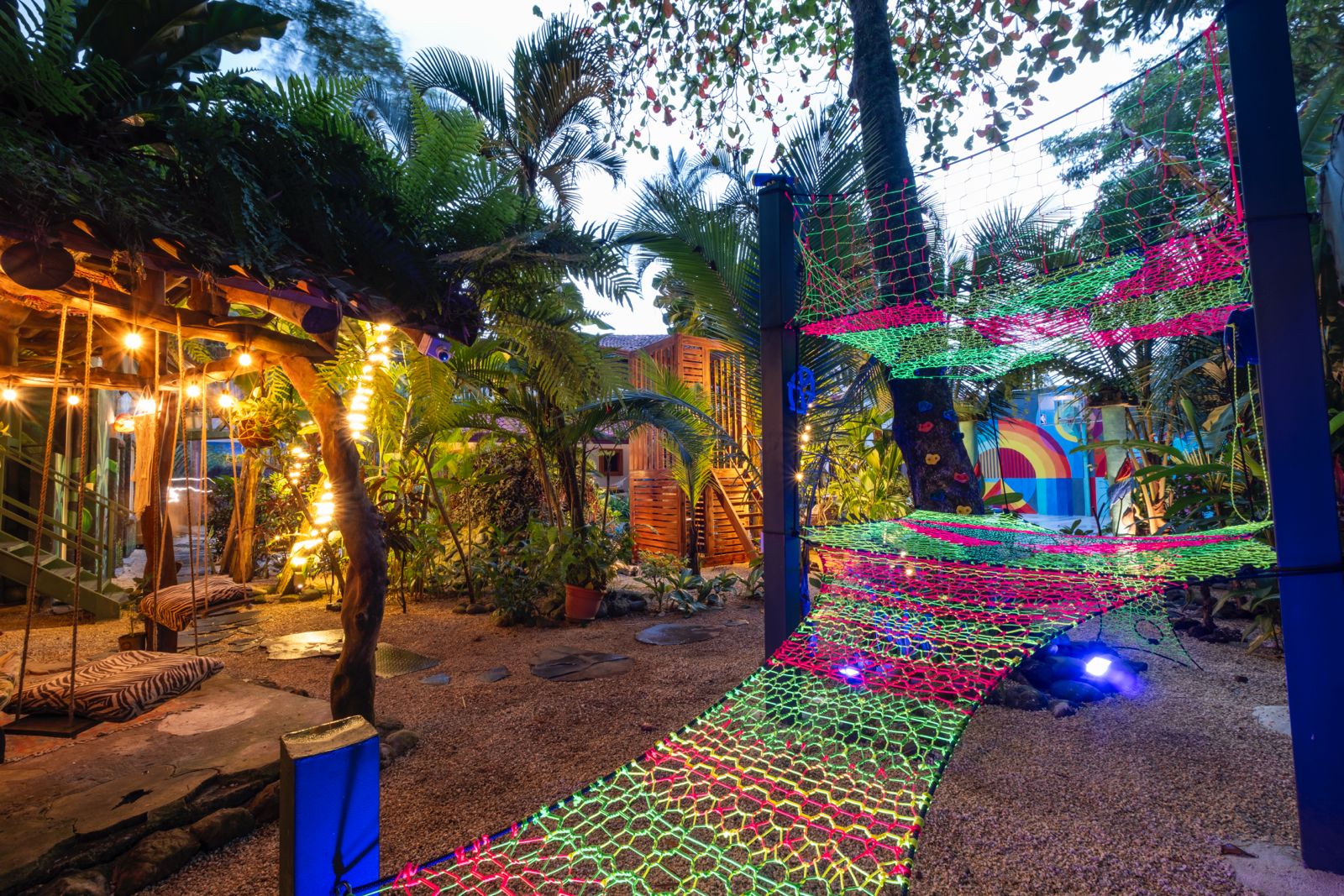 Glowing neon net playground in the tropical garden