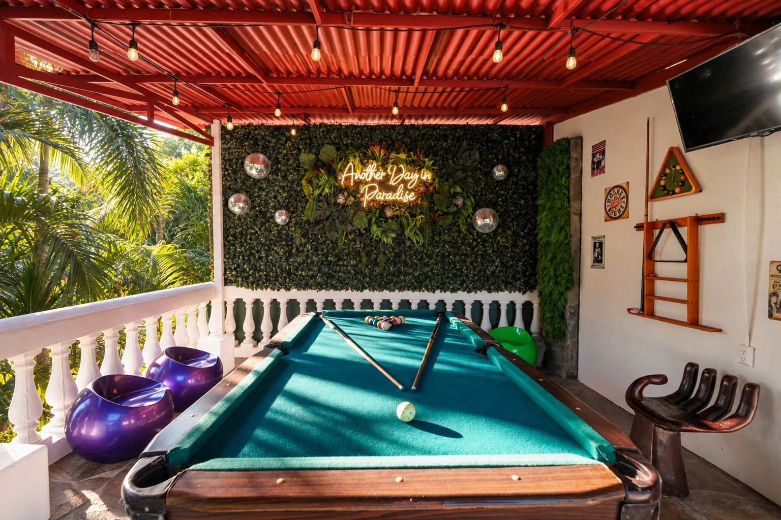 Covered pool table terrace with neon sign