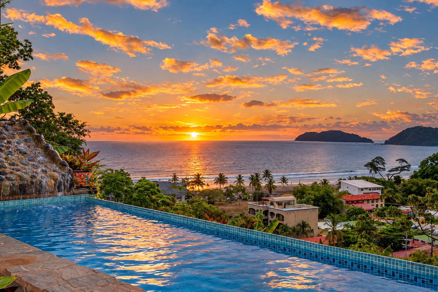 Infinity pool and sunset over the Jaco coastline