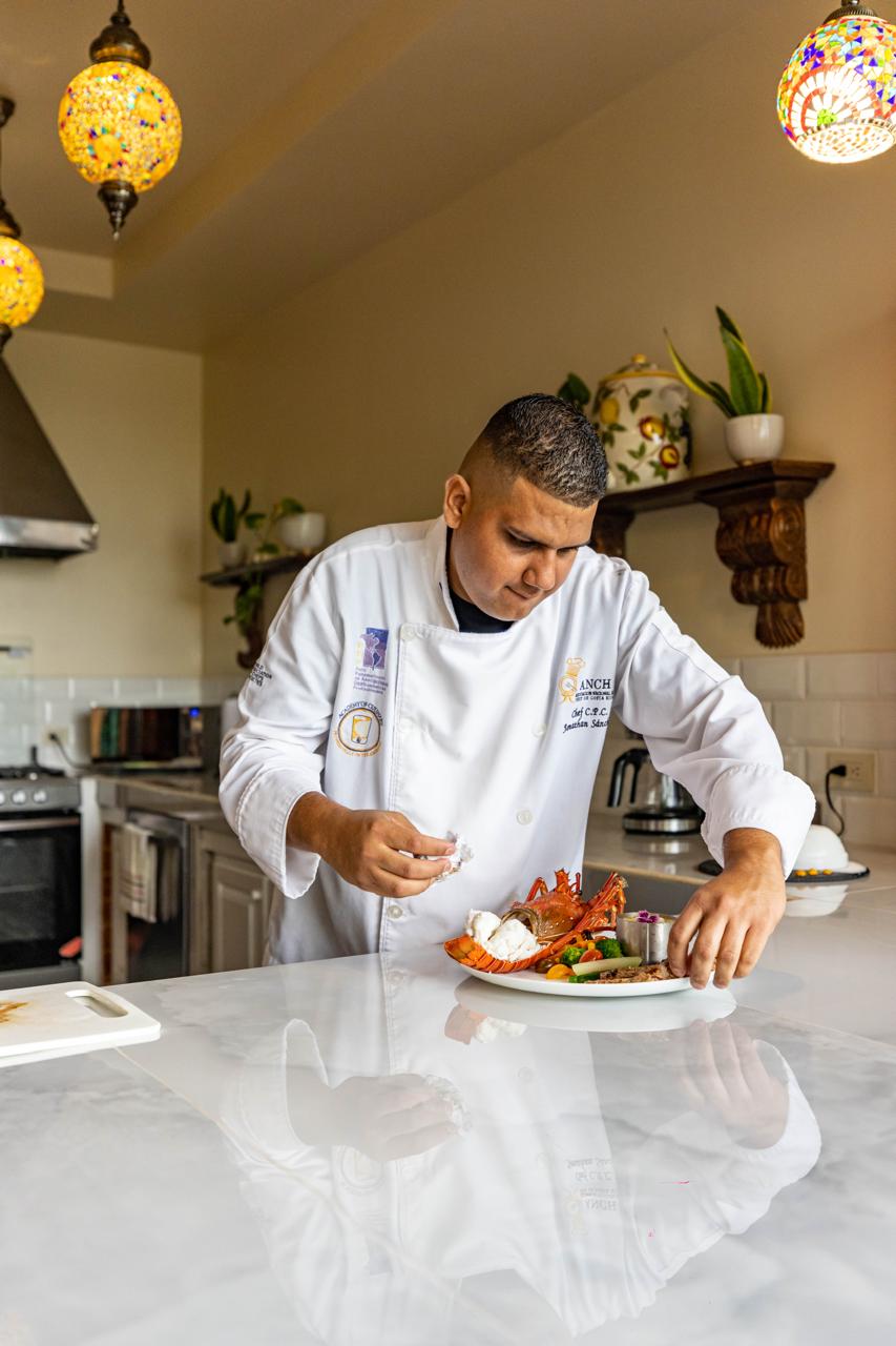 Private chef preparing a dish in the kitchen
