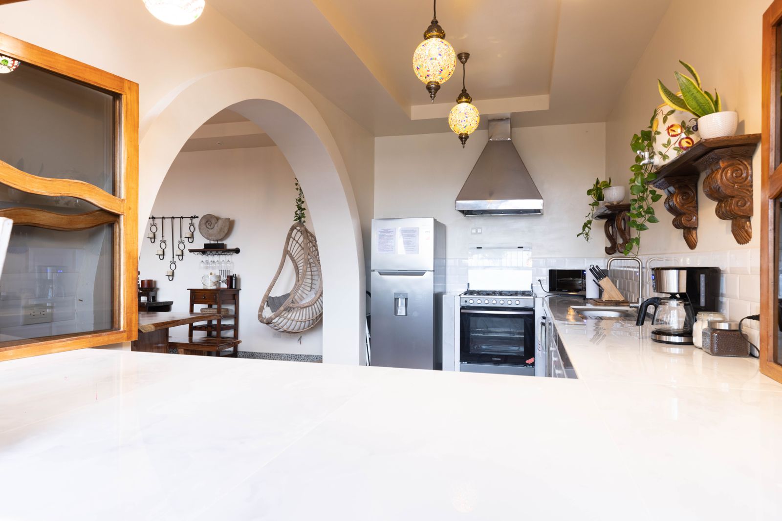 Kitchen with white marble counter
