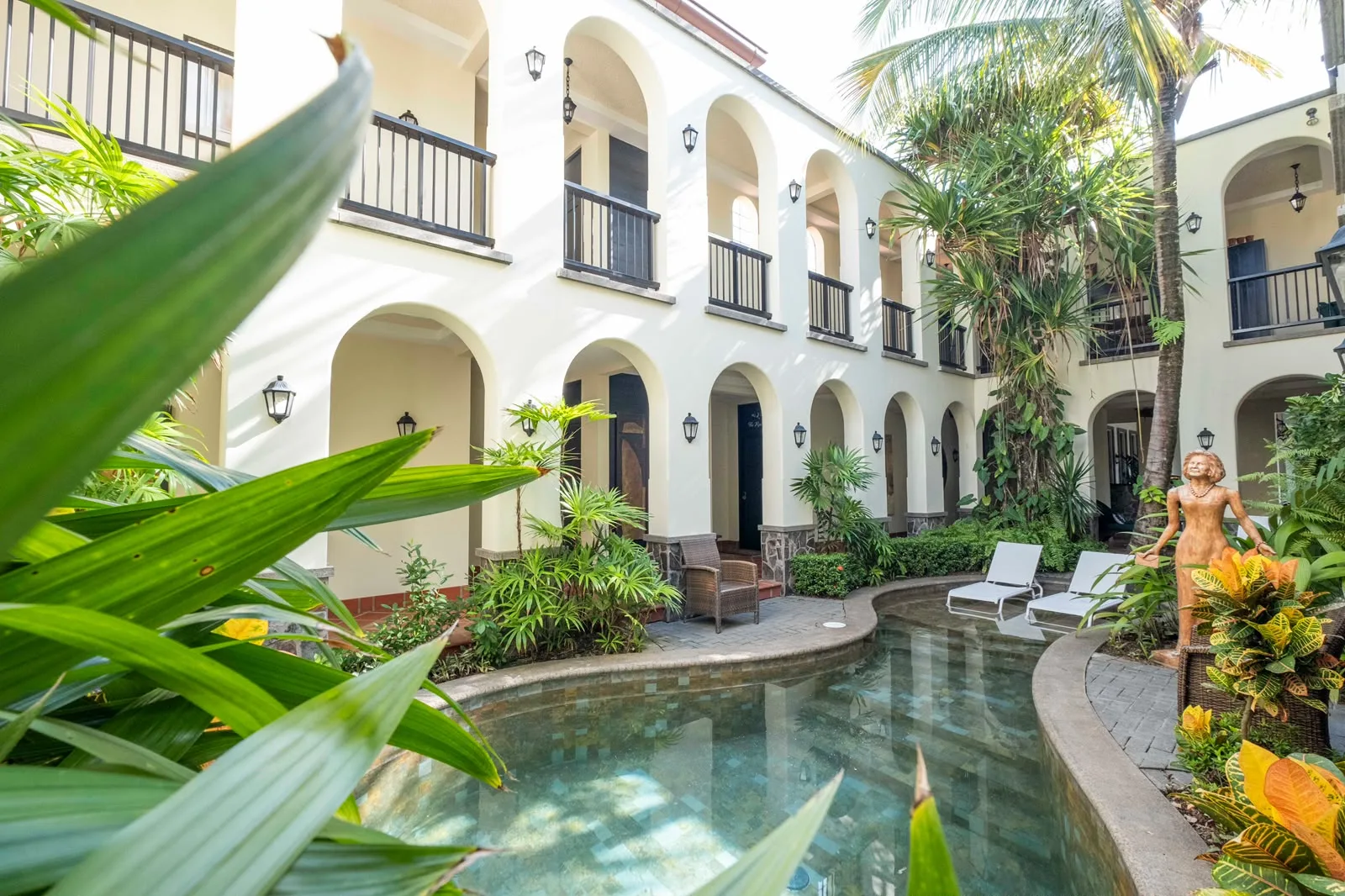 Arched courtyard and pool at Villa Montine