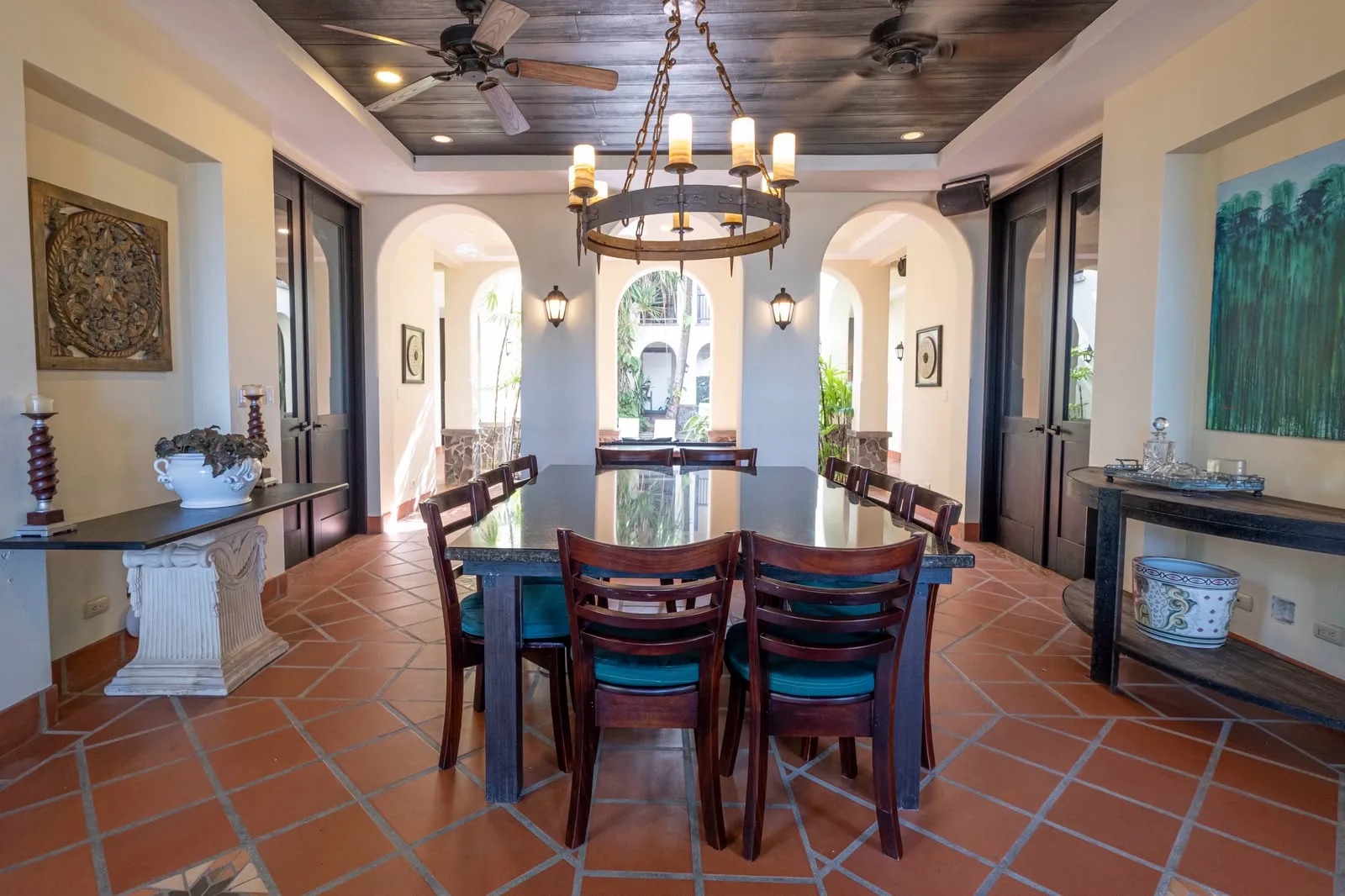 Dining room with chandelier and tiled floor